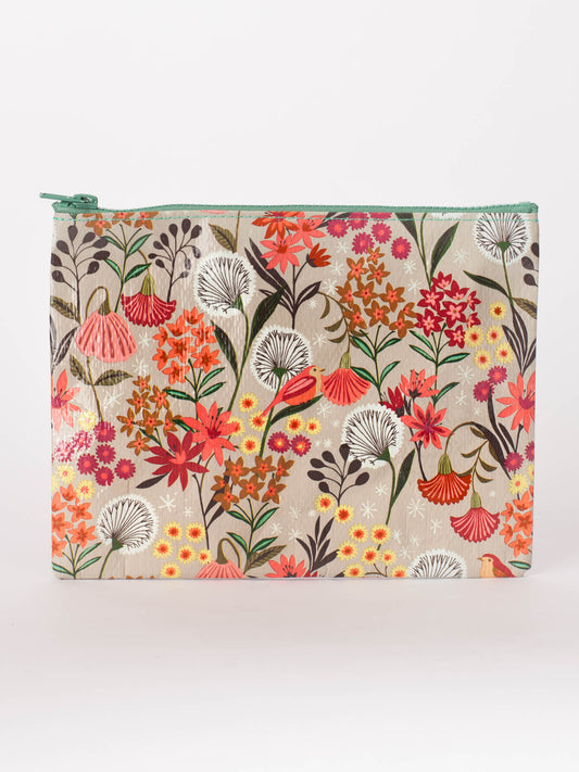 The Dandelion Zipper Pouch by Blue Q features a vibrant floral design with orange, pink, red, and white flowers plus green leaves on a light background, finished with a sage zipper—perfect for sweet storage.