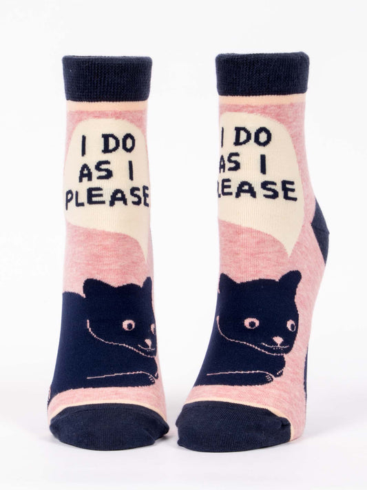 Blue Q's "I Do As I Please" W-Ankle Socks feature a black cat with speech bubbles on light pink nylon, accented by dark blue cuffs, heels, and toes.