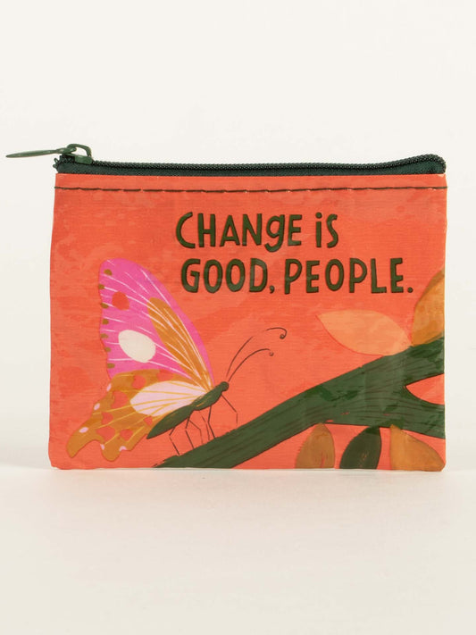 The Blue Q Change Is Good, People. Coin Purse is a small orange zippered pouch with a vibrant butterfly and the phrase “CHANGE IS GOOD, PEOPLE.” – ideal for carrying coins or small snacks wherever you go.