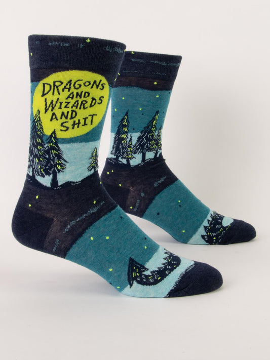 Blue Q Dragons And Wizards And Shit M-Crew Socks: blue combed cotton socks with a forest, starry night, trees, and a large yellow moon featuring the text "DRAGONS AND WIZARDS AND SHIT.