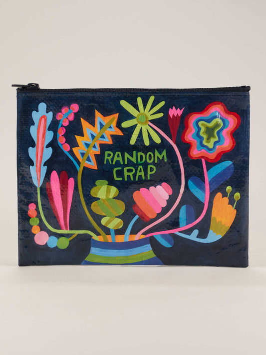 The Blue Q Random Crap Floral Zipper Pouch features vibrant abstract flowers and plants, "RANDOM CRAP" in green block letters at the center, and a dark blue background—perfect for storing your essentials with flair.