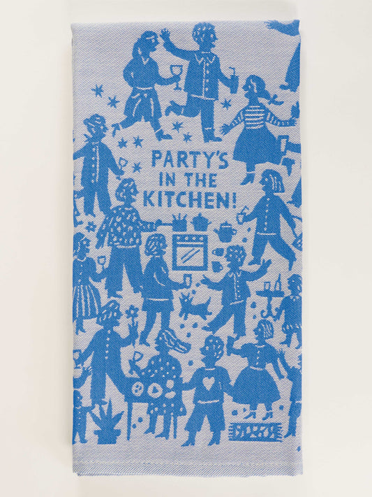 The Blue Q Party's In The Kitchen Dish Towel features blue and white illustrations of people celebrating and “PARTY'S IN THE KITCHEN!” in the center—an ideal festive touch for your next gathering.