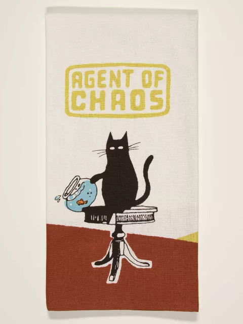 The Blue Q Agent of Chaos Dish Towel features a black cat toppling a fishbowl and bold yellow text that reads "AGENT OF CHAOS—a brazen bitch with attitude!.