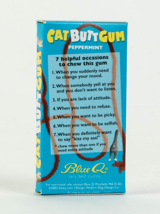 A blue gift box of Blue Q's Cat Butt Gum, peppermint flavor, features seven funny reasons to chew with attitude and a cartoon cat’s rear end and tail on the packaging.