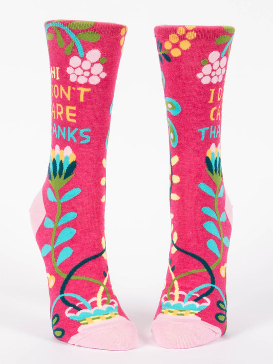 Blue Q’s Hi, I Don't Care, Thanks W-Crew Socks for women feature bright pink fabric with colorful floral patterns and “I DONT CARE THANKS” in yellow and blue, light pink heels/toes, and a comfy nylon-cotton blend.