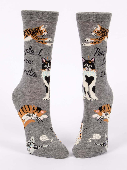 Blue Q People I Love: Cats W-Crew Socks are gray, made from soft combed cotton, and feature playful cat designs with black text that says “People I love: 1. Cats.”.