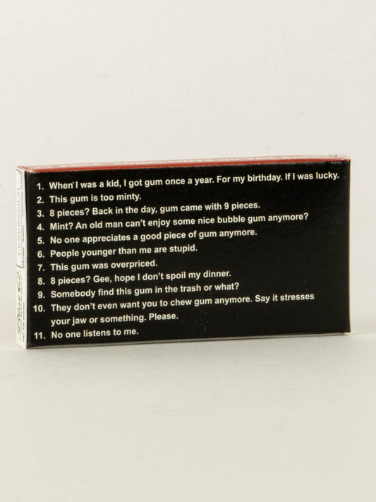 Grumpy Old Man Gum by Blue Q comes in a black pack with white text listing 11 classic complaints about mint gum, like "This gum is too minty" and "No one appreciates a good piece of gum anymore.
