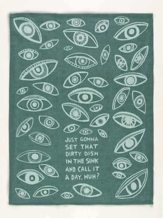 The Blue Q "Just Gonna Set That Dirty Dish In The Sink And Call It A Day, Huh?" Dish Towel is green, decorated with illustrated eyes and the witty phrase in white text at the bottom center.