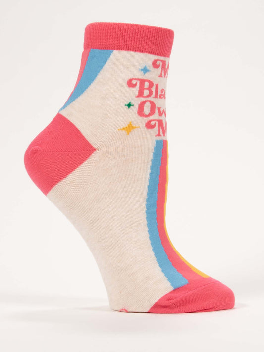 The Blue Q My Bladder Owns Me W-Ankle Socks are vibrant, combed cotton ankle socks with pink accents and multicolored stripes on a cream base, featuring retro-style text. Shown on a foot model with a plain white background.