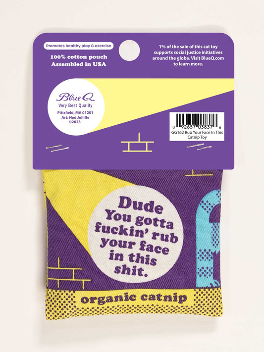 The Dude You Gotta Fuckin’ Rub Your Face In This Shit Catnip Toy by Blue Q is an organic catnip pouch with playful graphics. Proceeds support social justice initiatives for healthy play.