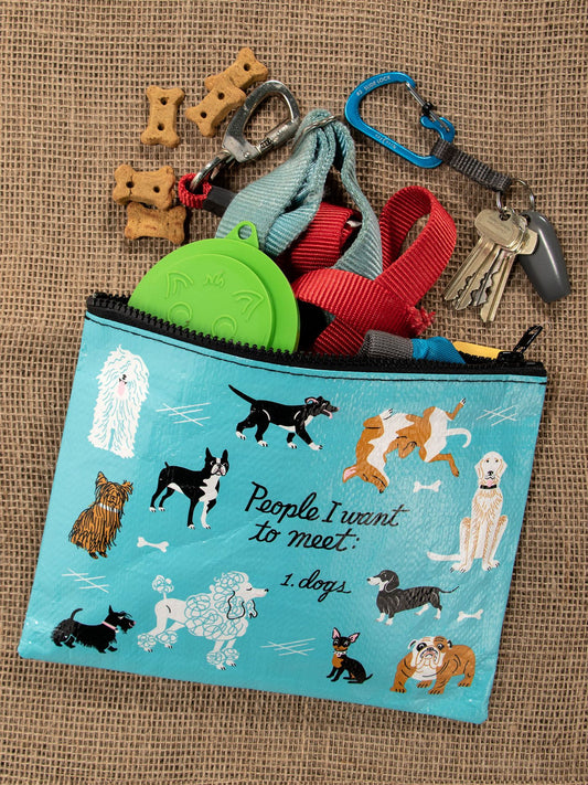 The Blue Q "People I Want To Meet: Dogs" Zipper Pouch features funny text and adorable dog illustrations—ideal for introverts. Great for holding treats, leashes, keys, and a green poop bag holder. Perfect gift for dog lovers!.