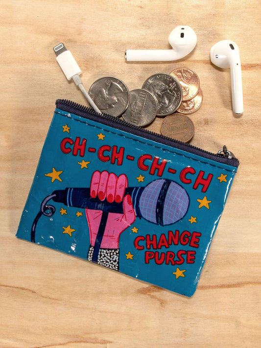 The Blue Q Ch-Ch-Ch-Ch Change Purse Coin Purse is a small blue pouch featuring a hand with a microphone and the phrase “CH-CH-CH-CH CHANGE PURSE”—a quirky accessory for coins and essentials.