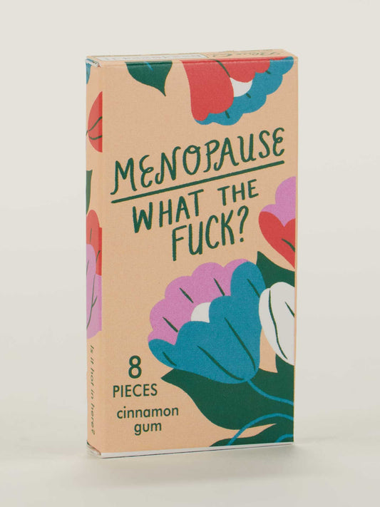 A vibrant box from Blue Q features "Menopause. What The Fuck? Gum" and contains 8 pieces of bold, playful candy-coated cinnamon gum.