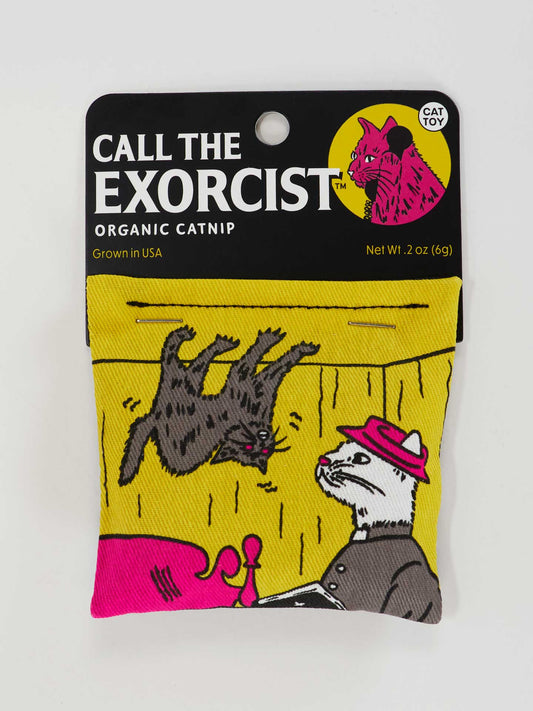 The Blue Q Call The Exorcist Catnip Toy features a cat in a hat raising its paw and another flying dramatically, making it a fun choice for any playful cat.