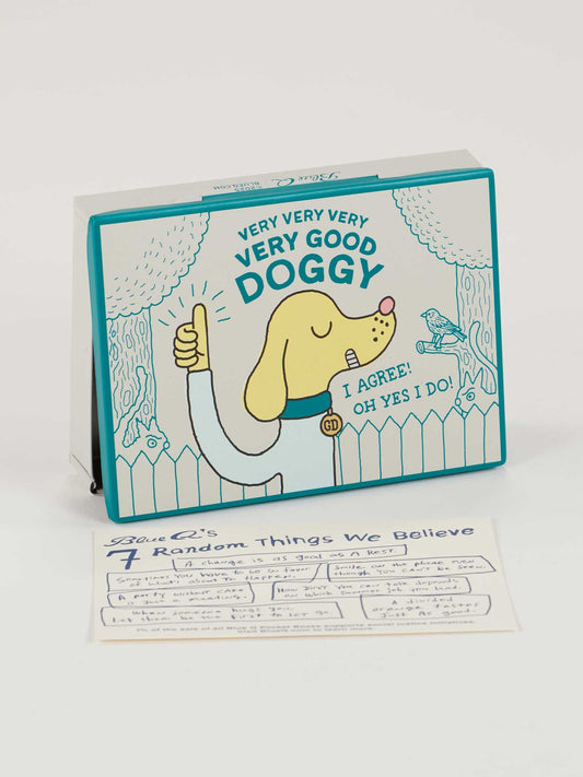 The Very Very Very Very Good Doggy Pocket Box by Blue Q features a yellow dog giving a thumbs up and saying “I agree! Oh yes I do!”—a perfect pet gift for any dog lover. Includes space for a handwritten note in front of the card.