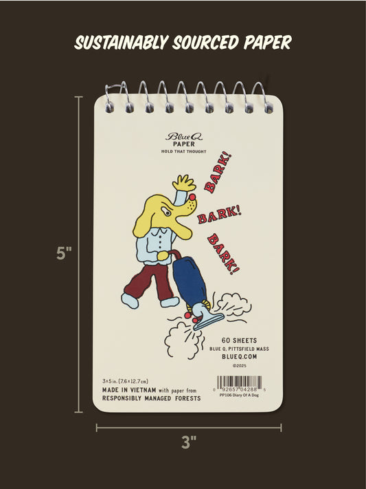The Blue Q "Diary Of A Dog. Licked Some Faces, Sniffed A Bush, Barked At A Vacuum" 3x5 spiral notebook shows a cartoon dog barking at a chipmunk by someone’s legs. Features “Sustainably Sourced Paper” above and paper sourcing details below.