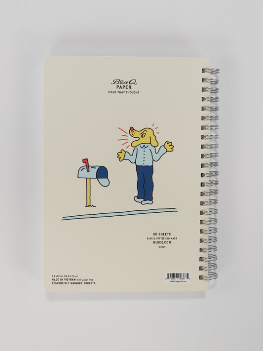 The Blue Q Doggy Do List 6x8 Spiral Notebook features a cartoon dog by an open mailbox, looking surprised, against a light background. The cover reads "BLUE Q PAPER HOLD THAT THOUGHT" at the top.