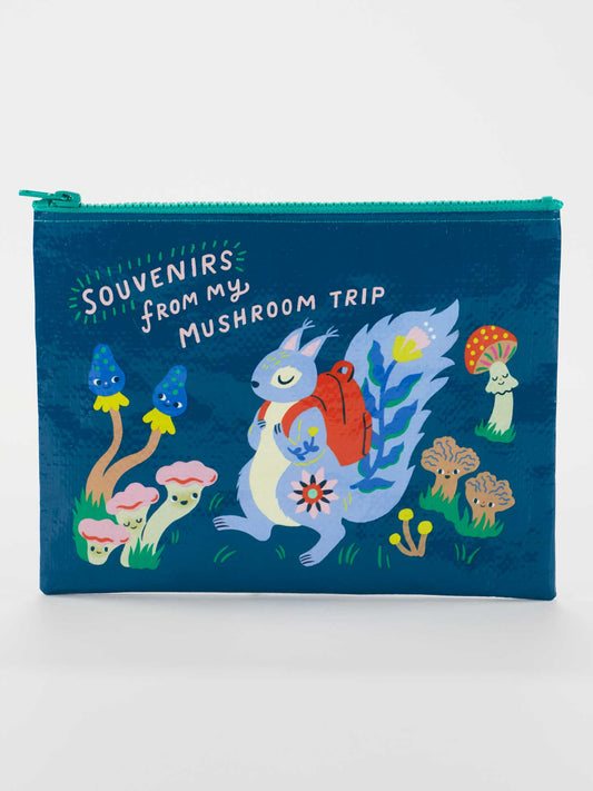The Blue Q Souvenirs From My Mushroom Trip Zipper Pouch is eco-friendly, blue, and features a squirrel with a red backpack among colorful mushrooms, plus the phrase “SOUVENIRS FROM MY MUSHROOM TRIP” on top.