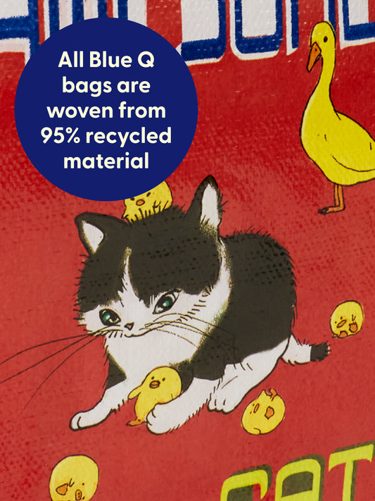 The Blue Q Awesome Cat Shopper features a delightful cartoon cat surrounded by yellow ducklings on a vibrant red background, perfectly capturing the charm of awesome cats. A blue circle highlights that all Blue Q bags are woven from 95% recycled material.