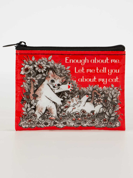 The Blue Q "Enough About Me. Let Me Tell You About My Cat." Coin Purse is a red eco-friendly zippered pouch with two illustrated cats in a garden and playful text declaring your love for cats.