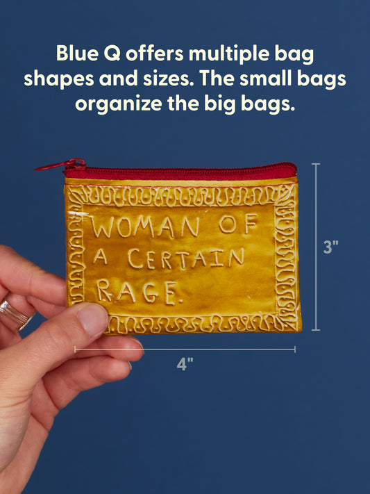 A hand holds the Blue Q Woman Of A Certain Rage Coin Purse—a small, yellow zippered pouch measuring 3 by 4 inches—against a blue background, as if welcoming you to the club. Text explains that Blue Q offers bags in a variety of shapes and sizes.