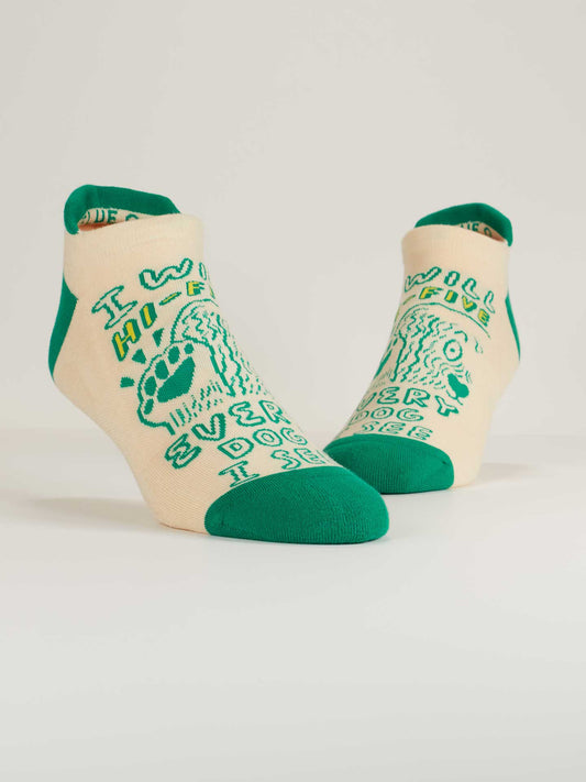 Blue Q’s “I Will Hi-Five Every Dog I See” Sneaker Socks are cream with green heels, toes, and cuffs, a cartoon dog, playful text in green lettering, and a soft heel tab for extra comfort.