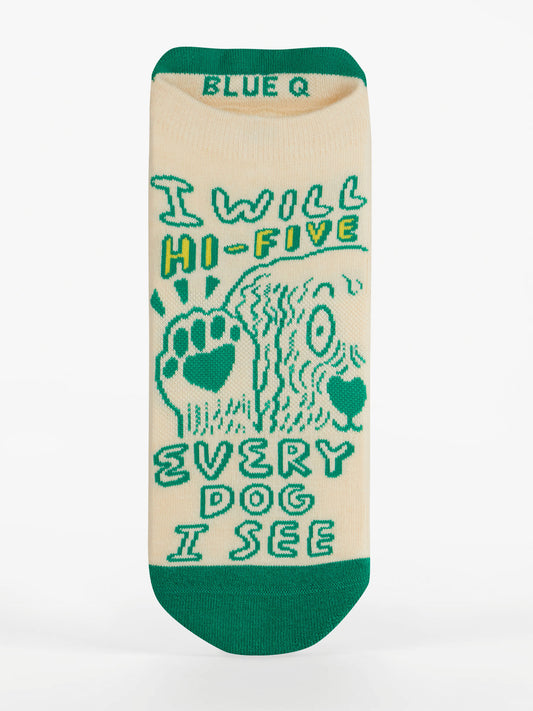 The Blue Q I Will Hi-Five Every Dog I See Sneaker Socks are cream-colored with green accents, a dog illustration, and fun text. Enjoy all-day comfort with shock-absorbing cushioning and the Blue Q logo on the toe.