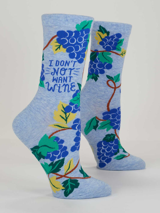 Blue Q’s I Don't Not Want Wine W-Crew Socks feature light blue combed cotton, spandex, and nylon with grape clusters, leaves, vines, and “I DONT = NOT WANT WINE” in blue near the top.