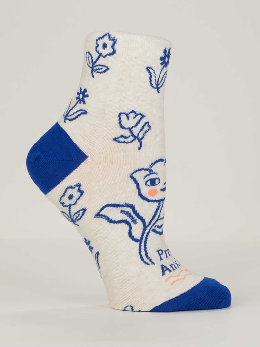 Blue Q's Pretty Anxious Ankle Socks for women (shoe size 5-10) are cream-colored combed cotton with blue toe and heel, blue floral and animal line art (including a fox with orange nose), plus “Prancing Animal” text near the sole.