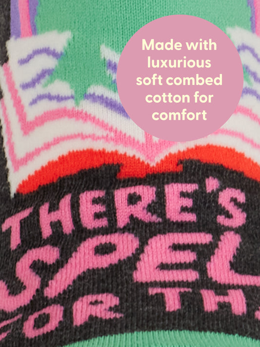 Close-up of Blue Q There's A Spell For That W-Ankle Socks—colorful knit fabric with the phrase “THERES A SPELL FOR THAT,” made from soft, luxurious combed cotton for comfort.