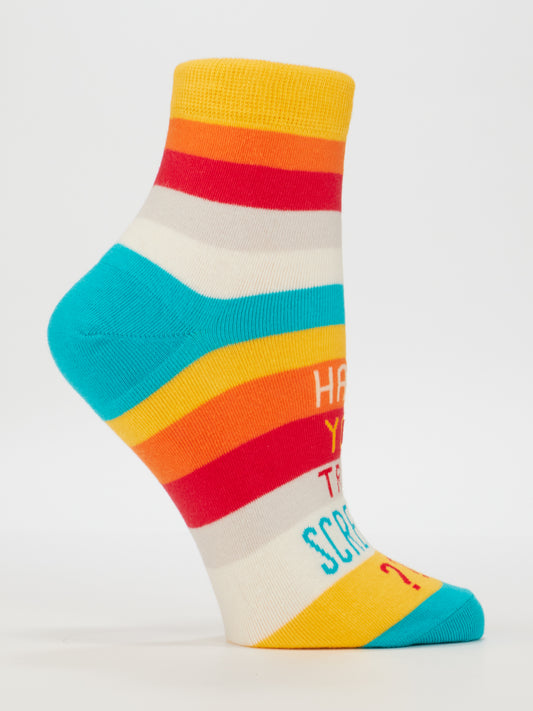 The Blue Q "Have You Tried Screaming???" women's ankle socks (size 5-10) feature colorful horizontal stripes and partial text, made from soft combed cotton, shown on a foot-shaped mannequin against a white background.