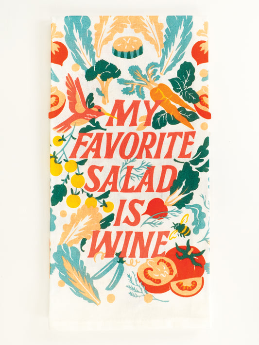 The My Favorite Salad Is Wine Dish Towel by Blue Q features bold red lettering surrounded by veggies and leaves, printed on super-absorbent unbleached cotton for a colorful, fun addition to your kitchen.