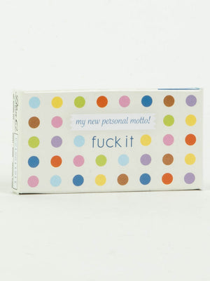 A rectangular box with colorful polka dots and the phrase "my new personal motto! fuck it" holds 8 pieces of vibrant fruit-flavored French candy. Product: Fuck It Gum by Blue Q. White background design.