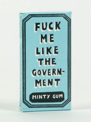 A blue box of Blue Q's “Fuck Me Like The Government Gum” features bold black and white text. This candy-coated gum packs a powerful peppermint punch in every bite.
