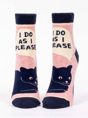 Blue Q's "I Do As I Please" W-Ankle Socks feature a black cat with speech bubbles on light pink nylon, accented by dark blue cuffs, heels, and toes.