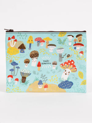 The Cute Lil Mushrooms Zipper Pouch by Blue Q features cheerful button mushrooms, plants, and "YOU’RE BEAUTIFUL" printed in the center—a charming, light blue accessory that’s cute as a button!.