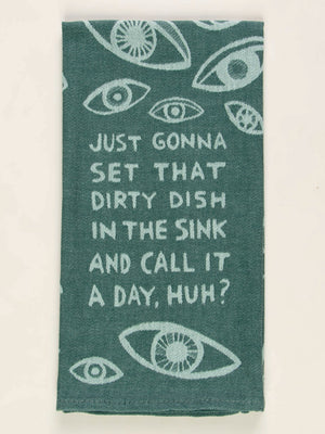 The Blue Q "Just Gonna Set That Dirty Dish In The Sink And Call It A Day, Huh?" Dish Towel features teal fabric, light blue staring eyes, and witty text—a quirky addition to your kitchen decor.