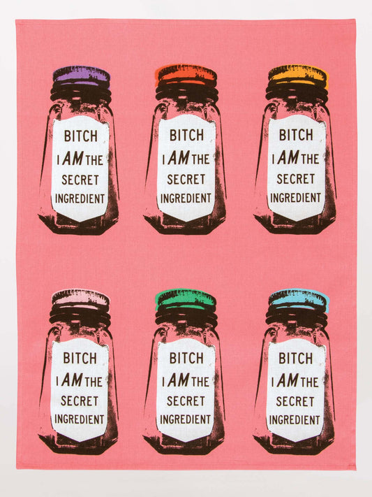 The Bitch I Am The Secret Ingredient Dish Towel by Blue Q features a bold, funny design—perfect as a humorous gift or cheeky kitchen accent for anyone who loves to cook and appreciates a good laugh.