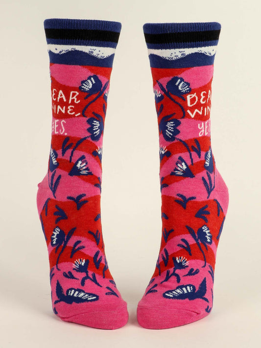 Blue Q Dear Wine, Yes. W-Crew Socks feature combed cotton in pink and red with blue and white floral designs. Each sock says: DEAR WINE, YES., finished with navy blue cuffs and a wavy white accent.