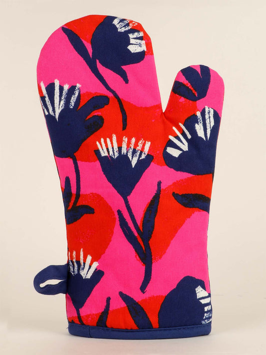The Blue Q Dear Wine, Yes. Oven Mitt features a bold floral pattern in navy and white on a red and pink background—an eye-catching, romantic gift for cooking enthusiasts.