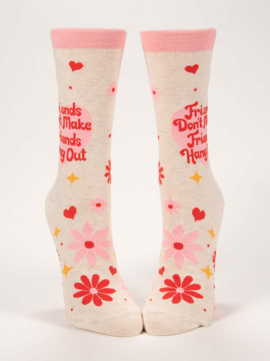 Blue Q Friends Don't Make Friends Hang Out W-Crew Socks: Cream-colored crew socks featuring pink toes, heels, and cuffs with pink and red hearts, flowers, and stars. Made from soft combed cotton and spandex for comfort.