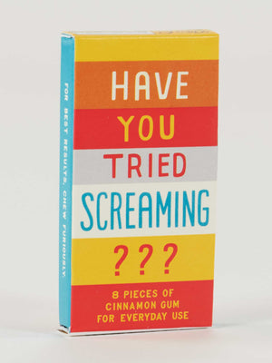 Blue Q’s Have You Tried Screaming??? Gum features 8 cinnamon-flavored pieces in a colorful striped box with bold text. The design includes red, yellow, orange, blue, and white stripes—perfect for everyday gum chewers.