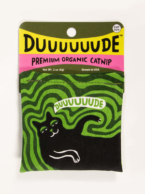 The Blue Q Duuuuuude Catnip Toy features premium organic, USA-grown catnip in a cotton pouch. The package shows a laid-back black cat on a green spiral background, perfect for healthy play.