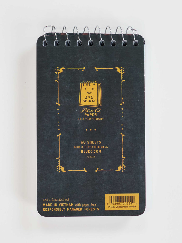 The Ghosts Were People Too 3x5-inch spiral notebook by Blue Q features a black cover with gold text, a notebook illustration, and 60 sheets—ideal for haunted house stories or ghost snack lists. Barcode printed at the bottom.