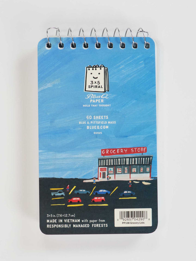 The Blue Q "When I Go, I Want To Be Remembered For My Grocery Lists" 3x5 spiral notebook features a vibrant grocery store scene on the cover and has 60 responsibly sourced sheets—perfect for your lists or notes.