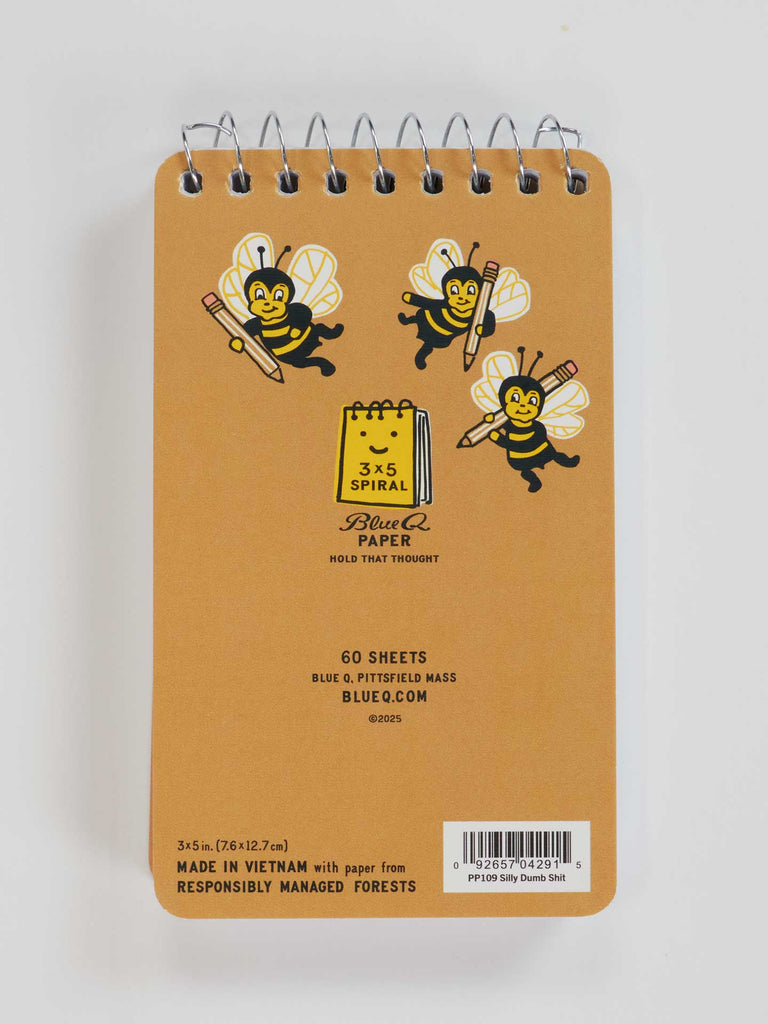 The Blue Q Silly Dumb Shit 3x5 Spiral Notebook features a brown cover with three cartoon bees and notebook art, plus the text “3x5 Spiral Space Paper, Hold That Thought, 60 sheets”—ideal for jotting down playful or goofy ideas.