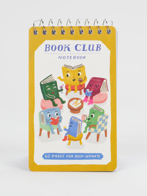 A cheerful yellow Blue Q Book Club 3x5 Spiral Notebook cover shows cartoon books with faces animatedly chatting in chairs around a table filled with snacks and a glass of wine. The cover reads “BOOK CLUB NOTEBOOK” and contains 60 pages for your deepest book club insights.