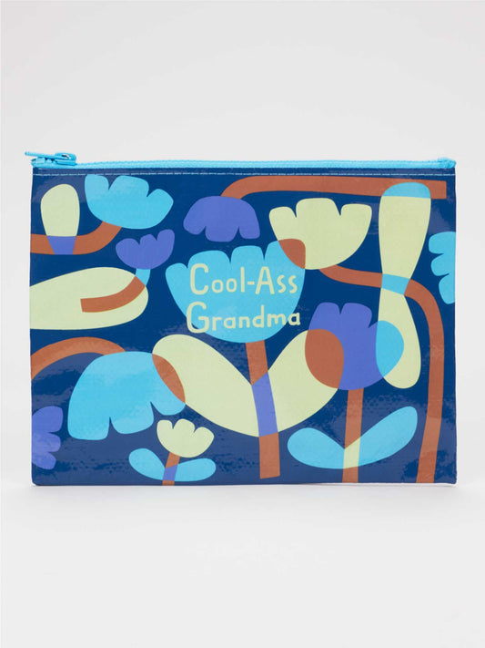 The Blue Q Cool-Ass Grandma Zipper Pouch is crafted from recycled materials in vibrant blue, featuring abstract colorful flowers and "Cool-Ass Grandma" in light yellow text at the center—making it a perfect gift for any cool grandma.