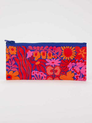 The Bright Blooms Pencil Case by Blue Q features a vibrant floral pattern in shades of red, pink, and orange, accented by a blue zipper on top. Crafted from recycled material, this zippered pouch’s bold colors truly stand out against its plain white background.