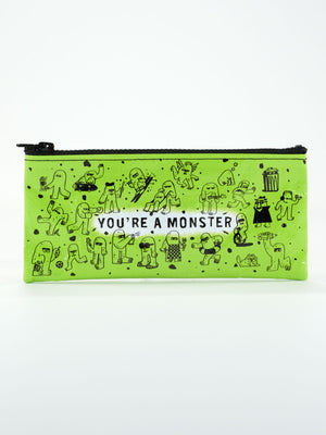 The Blue Q "You're A Monster Pencil Case" is a green zippered pouch with black cartoon monster drawings and bold white "YOU'RE A MONSTER" text—perfect for organizing your supplies.